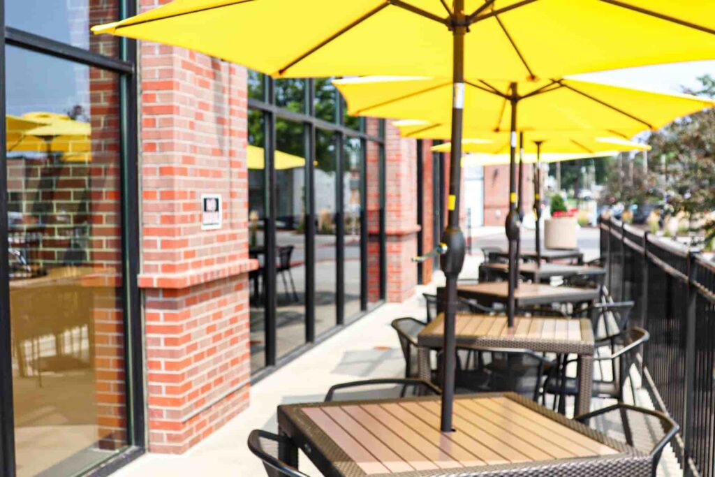 Outdoor patio with tables and umbrellas