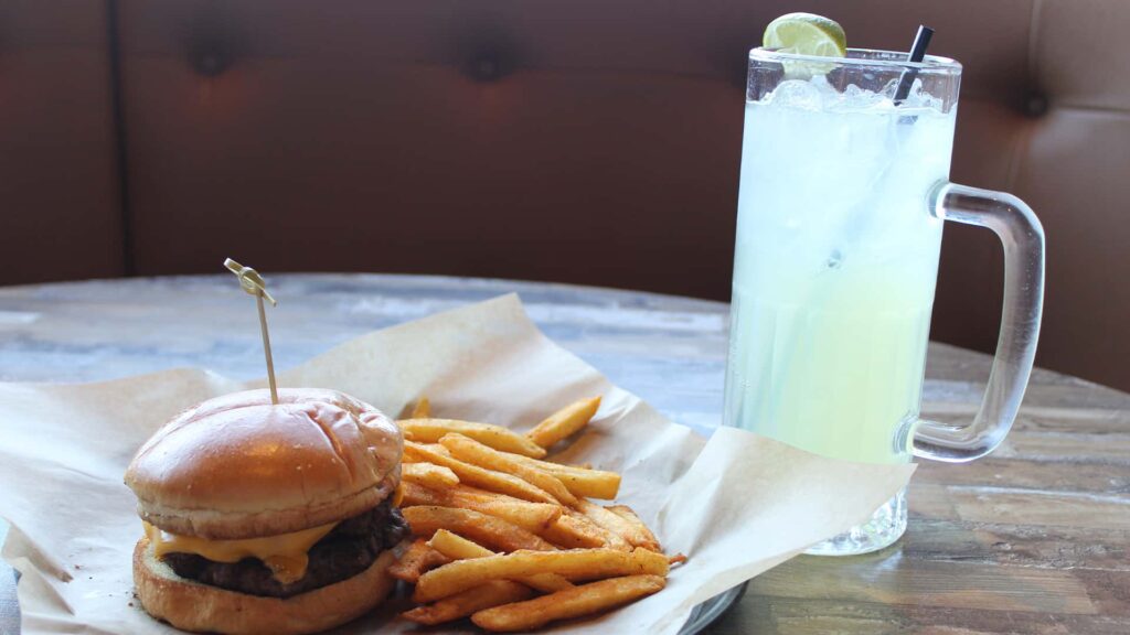 Burger and Margarita with a side of fries